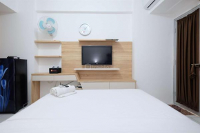 Modern and Homey Studio at Gunung Putri Apartment By Travelio